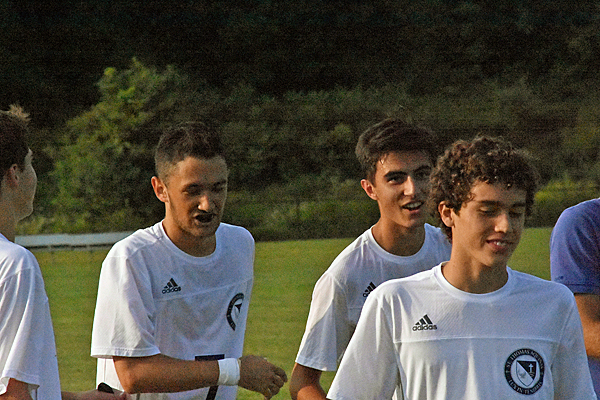 Miguel Diaz, Aaron Broom, and Gerardo Viana Torre smiling after the win